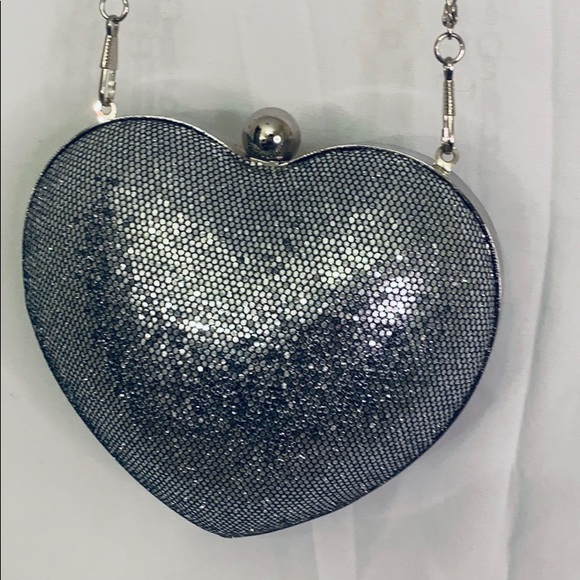 Forever 21 Handbags - Heart shaped little club Clutch